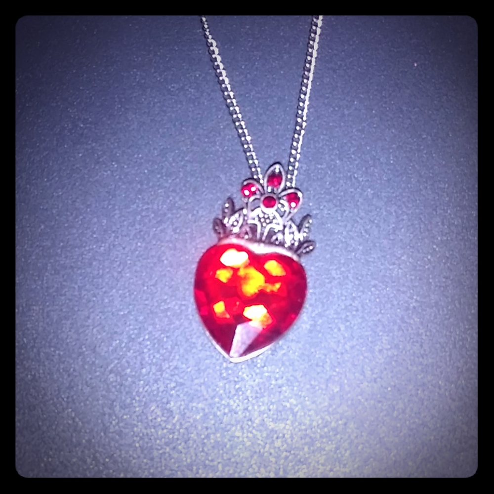 A homemade queen of hearts necklace